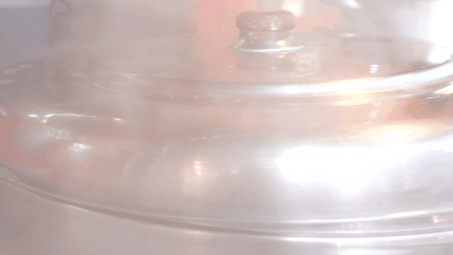 Steaming pot in kitchen