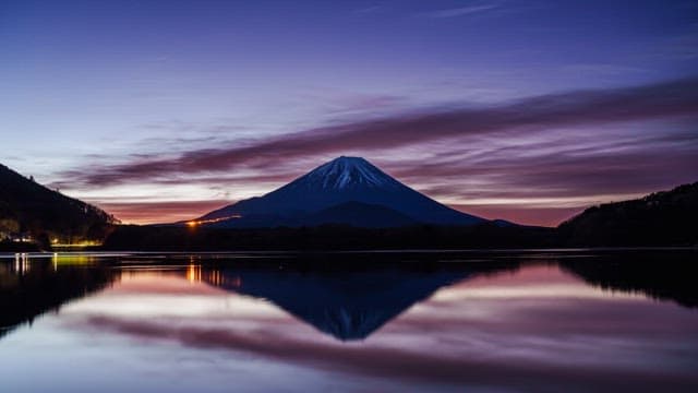 Mount Fuji at dawn with a serene lake