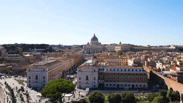 Classical cityscape centered around domed cathedral