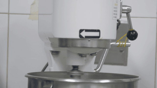 Industrial mixer in a kitchen setting