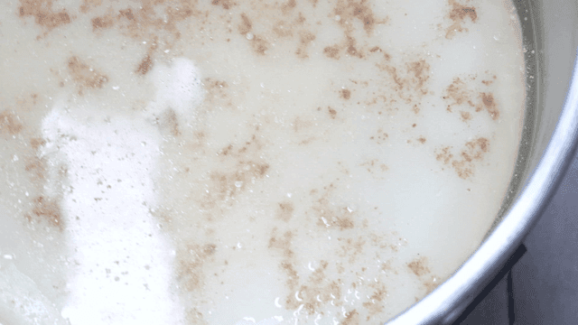 Fat layer of broth in large pot