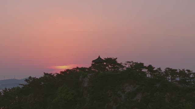 Sunset view with an old pavilion