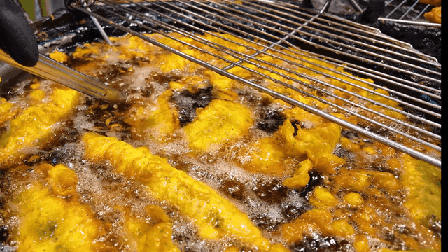 Deep frying battered food in hot oil