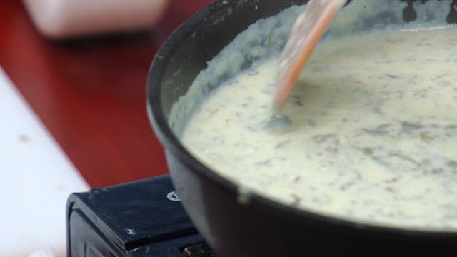 Cooking creamy dried radish greens soup