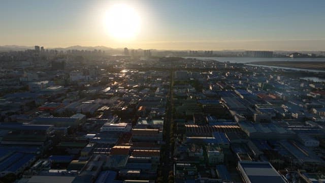 Sunset in an Industrial Complex with Dense Buildings and Factories