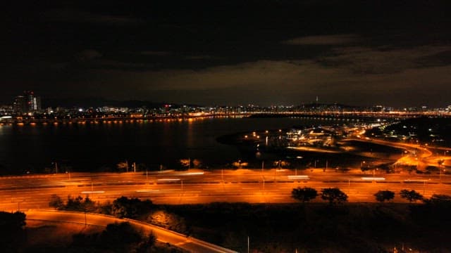 Road Illuminated by the Lights of Running Vehicles