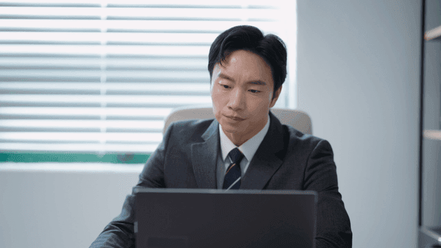 Businessman working on a laptop in an office