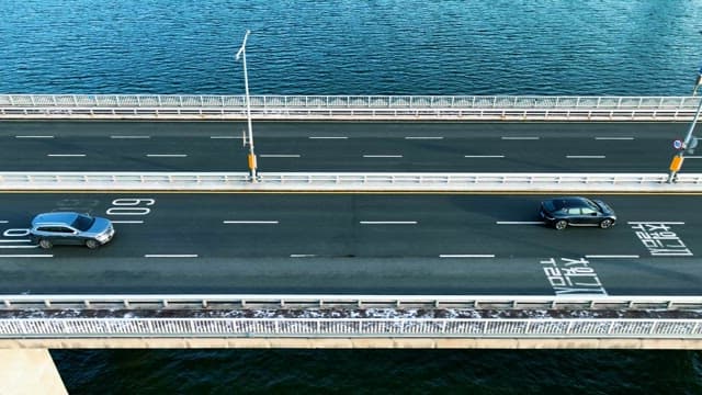 Vehicles Crossing a Bridge Over Han River