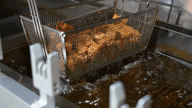 Fried chicken fried in hot oil