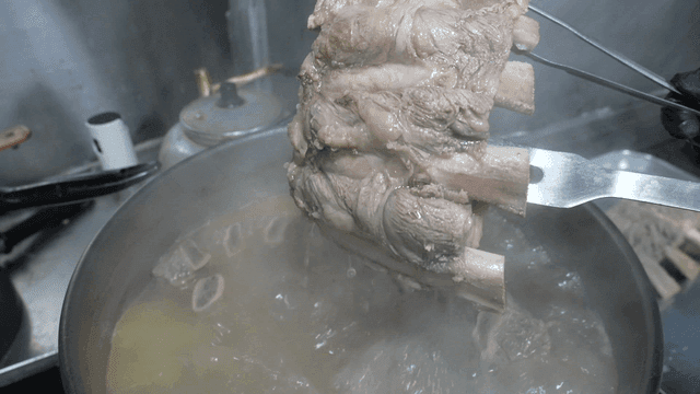 Tongs that lifted beef ribs out of pot