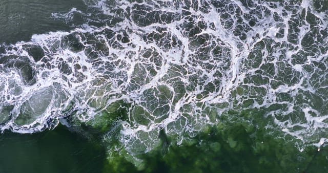 Waves crashing on the shoreline