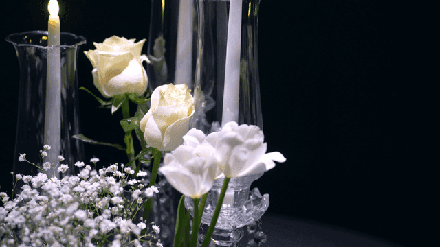 Elegant candlelit floral arrangement