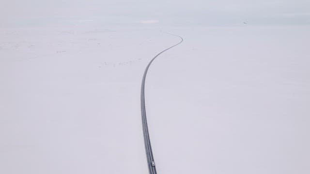 Car driving on a snowy road