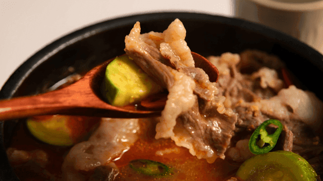 Spoonful of beef soybean paste stew with vegetables