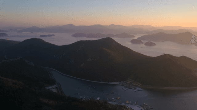 Expansive mountain landscape at sunset