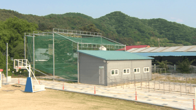 Sports facilities with basketball court and golf practice range