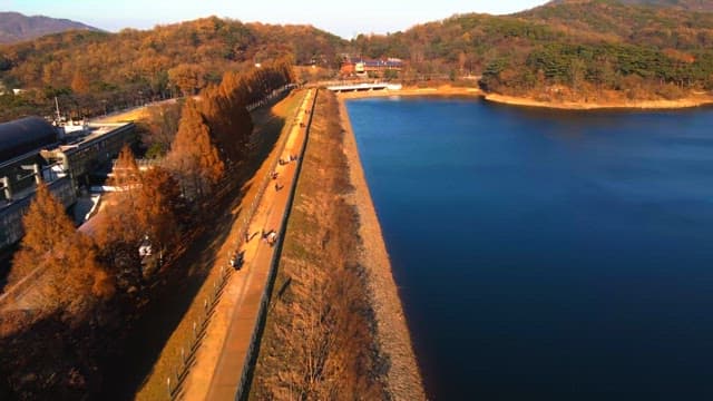 Long walking path along lake and surrounding scenery