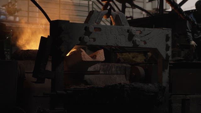 Molten metal being poured in a factory