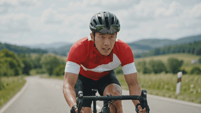 Person riding bicycle on road