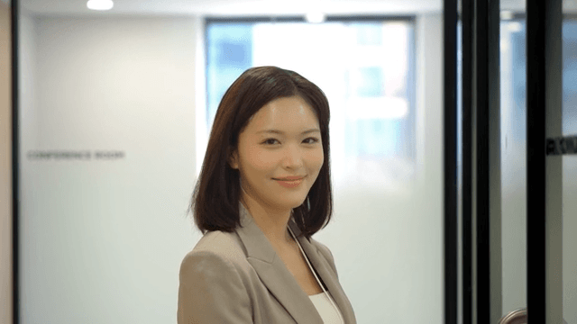 Working woman entering meeting room